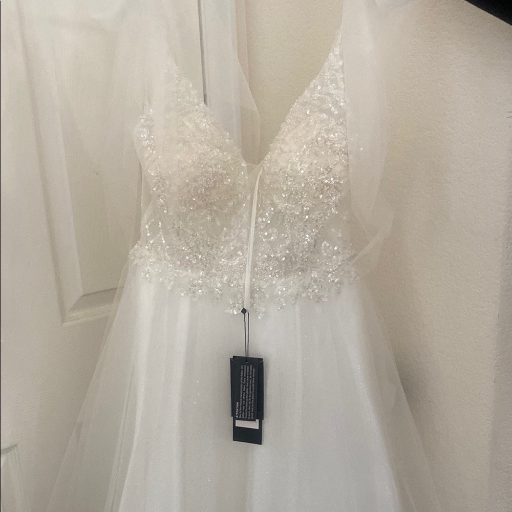 Elegant White Beaded Gown